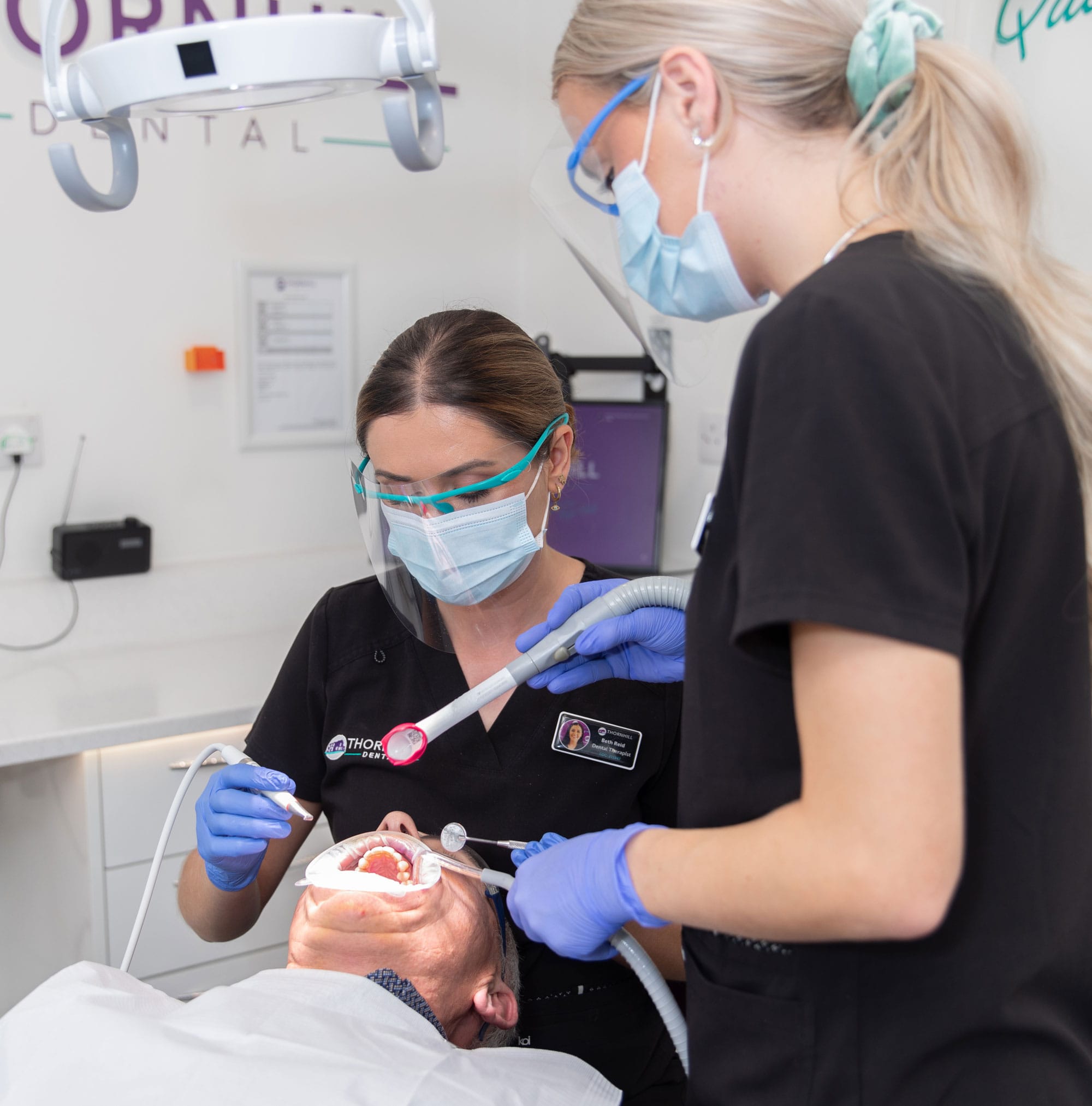 Dentist and dental nurse